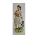 19th century Staffordshire figure, of a girl with dove perched on her right hand, wearing a puce