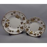 Minton Victoria Strawberry Plates, 10 1/2" and 8 1/2" respectively, together with two further Minton