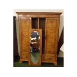 Late 19th or early 20th century burr walnut veneered wardrobe with central oval bevelled mirror over