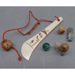 Bag of miscellaneous Oriental items comprising a stag antler bead Ojime, bone monkey Ojime,