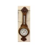 Late 19th or early 20th century Aneroid Barometer/Thermometer combination, in carved oak case