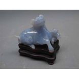 Small 20th century Chinese blue jade model of a buffalo, and accompanying hardwood stand, buffalo