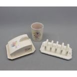 Mixed Lot: Poole Pottery Wares to include covered butter dish, toast rack and small cylinder vase (