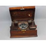 19th century rosewood tea caddy of sarcophagus form, the lifting lid enclosing an interior of two