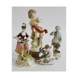 Derby figure of seated lady with accordion (losses), further European figure of putto clutching a