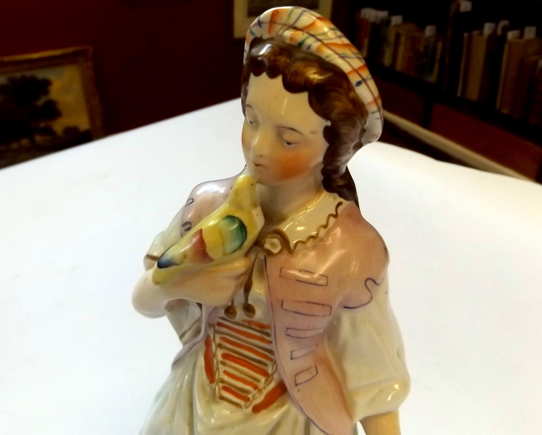 19th century Staffordshire figure, of a girl with dove perched on her right hand, wearing a puce - Image 5 of 7