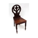 Victorian mahogany hall chair, the oval back with pierced central fleur-de-lys style splat over a