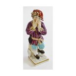 Berlin small figure, of a child with iron red bonnet and purple jacket, and turquoise pantaloons, 4"