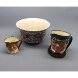Mixed Lot: Poole Pottery jardini re of flared form (cracked), together with two further Doulton
