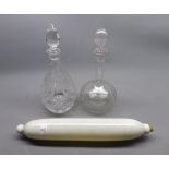 Mixed Lot: 19th century opaque glass rolling pin, together with two further cut clear glass