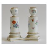 Pair of Meissen candlesticks, each with urn-formed sconces, cylindrical supports terminating in