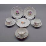 Collection of 20th century Meissen wares: two cups and saucers and three tea plates, all painted