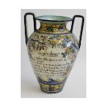 Faience type two-handled large urn, of tapering circular form, inscribed with verse entitled "As