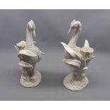 Pair of 20th century candle holders, formed as cranes amongst reeds, unsigned