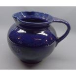 Large late 19th or early 20th century blue glazed jug, unsigned