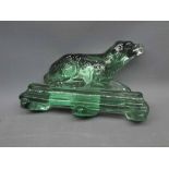 Unusual green glass doorstop, modelled as a reclining retriever dog, 4" high