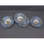 Set of six small Majolica plates, decorated with central horse motif, 7 1/2" diameter