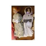 Two vintage cloth bodied dolls in flowing outfit, approx 12" high