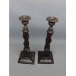 Pair of oak barley twist candlesticks