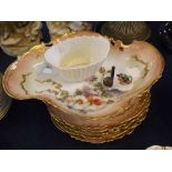 Mixed Lot: four Limoges floral and gilt highlighted plates, together with matching serving dish,