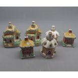 Group of six small 19th century Staffordshire model cottages, varying designs, largest approx 4 1/2"