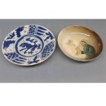 Royal Doulton Fagin circular dish, together with a further 19th century blue and white glazed