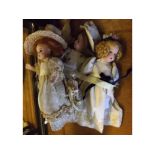 Three assorted bisque headed dolls all approximately 7" high