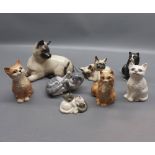 Collection of eight various 20th century pottery cats, to include examples by Beswick, Doulton and