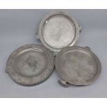 Mixed Lot: three antique pewter Warming Plates of circular form, fitted with double looped