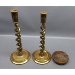 Pair of brass barley twist candlesticks and a further trench art ashtray