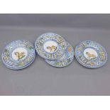 Set of six small Majolica plates, decorated with central horse motif, 7 1/2" diameter