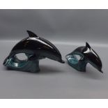 Two Poole Pottery model dolphins