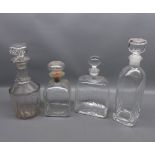 Mixed Lot: four various 19th and 20th century clear glass decanters