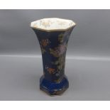 Carlton Ware octagonal vase, decorated with peacock amongst foliage