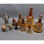 Collection of Wade Whisky Bells, together with further Beswick novelty whisky decanters to include