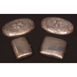 Mixed Lot: two hallmarked silver backed brushes embossed with angels' faces, together with two