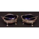 Pair of Edward VII open salts, each of oval form with cast and applied gadrooned and shell
