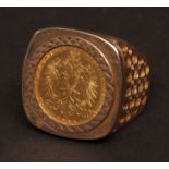 Gold Austrian 4 Florins 10 Francs coin ring, dated 1892 (restrike) set in a 9ct gold mount, gross