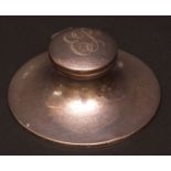 George V capstan inkwell, of typical circular form, the hinged cover with contemporary initials,