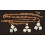 Modern opal set pendant and matching earrings, the stylised design of three cabochon opals set in