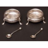 Pair of George V open cauldron salts, each with beaded rims and raised on cast and applied hook