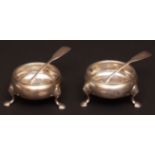 Two various late 18th century cauldron salts, each of typical polished form and raised on cast and