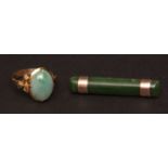 Mixed Lot: modern jade ring, with large oval cabochon cut stone, the mount stamped "22K" (5gms gross