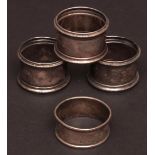 Mixed Lot: three matching napkin rings, each of circular form with beaded rims and a further
