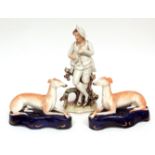 Pair of 19th century Staffordshire pen stands, applied with figures of reclining greyhounds,