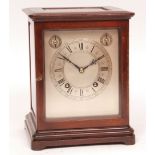 Early 20th century stained walnut four glass mantel clock, Winterhalder & Hofmeier, the plinth-