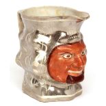 19th century Bacchanalian silver lustre jug, with central iron red grinning face (from the sale of