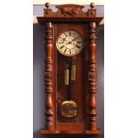 Late 19th/early 20th century Vienna type twin weight wall clock, the shaped pediment with