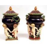 Pair of Copeland Majolica large covered urns of baluster form, the bodies encrusted with coiled