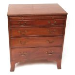 19th century mahogany bachelor's chest, plain top over a brushing slide with four graduated full